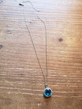 Sterling Silver Necklace With Blue Topaz Pendant